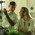 Lewis Pullman and Brie Larson in Apple TV+’s Lessons in Chemistry.