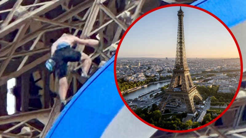 Un homme grimpe la Tour Eiffel juste avant la cérémonie de clôture des JO de Paris