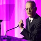 BEVERLY HILLS, CALIFORNIA - APRIL 10: Honorary Chair Tom Hanks speaks onstage during "An Unforgettable Evening" Benefiting The Women's Cancer Research Fund at Beverly Wilshire, A Four Seasons Hotel on April 10, 2024 in Beverly Hills, California.  (Photo by Amy Sussman/Getty Images for Women's Cancer Research Fund)