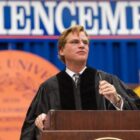 person at podium on Commencement stage