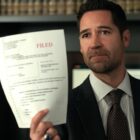 Micky Haller (Manuel Garcia-Rulfo) holding a legal document as seen in "The Lincoln Lawyer" season 3