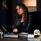 Benson sitting behind her desk, listening to someone with her head cocked on Law & Order: SVU Season 26 Episode 2