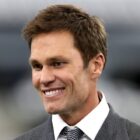 Tom Brady, former NFL quarterback, looks on before the Detroit Lions play the Dallas Cowboys at AT&T Stadium on October 13, 2024 in Arlington, Texas.