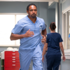 Ben Warren runs through the hospital in the lead photo for Grey