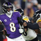 Lamar Jackson #8 of the Baltimore Ravens is sacked by Elandon Roberts #50 of the Pittsburgh Steelers during the third quarter during the AFC Wild Card Playoff at M&T Bank Stadium on January 11, 2025 in Baltimore, Maryland