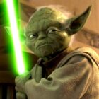 Yoda holding a green lightsaber in Star Wars: Attack of the Clones