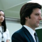 Mark sitting at his desk with Ms Huang in the background in Severance season 2 episode 6