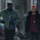 Brian Tyree Henry and Wagner Moura walking together in Apple TV+'s Dope Thief