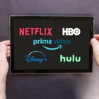Netflix, HBO, Prime logos on tablet 