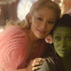 Ariana Grande and Cynthia Erivo looking into a mirror in Wicked