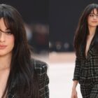 Camila Cabello poses for photos ahead of Chanel's fall 2025 ready-to-wear collection show during Paris Fashion Week.
