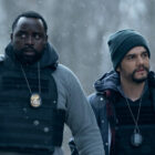 Brian Tyree Henry as Ray Driscoll and Wagner Moura as Manny Carvalho in 