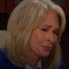 Marlena sitting at her desk with her eyes closed on Days of Our Lives during the week of 3-03-25