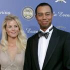 DETROIT - SEPTEMBER 15:  USA team member Tiger Woods with his fiance Elin Nordegren arriving at the 35th Ryder Cup Matches Gala Dinner at the Fox Theater on September 15, 2004 in Detroit, Michigan. (Photo by Andrew Redington/Getty Images)