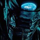 A close up of a xenomorph with Earth reflected on its head in the Alien: Earth TV show teaser