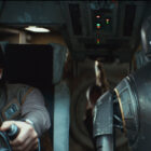 Cassian piloting a U-wing as K-2SO sits in the co-pilot seat in Andor season 2