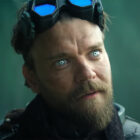 Pilou Asbaek's The Mule looking at something off-screen in Foundation season 3