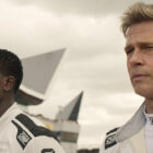 Damson Idris as Joshua Pearce and Brad Pitt as Sonny Hayes in F1