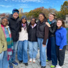 A group of students gathered around Phil Rosenthal in Boston.