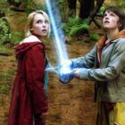 L-R: Leslie (AnnaSophia Robb) and Jess (Josh Hutcherson) look at a beam of light in a scene from "Bridge to Terabithia"