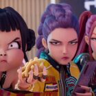 Zoey, Rumi, and Mira looking unimpressed as they eat in Kpop Demon Hunters