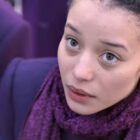 Agnes looks up at something offscreen