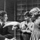 Prince Charles and Princess Anne meet naturalist David Attenborough at Lime Grove Studios on the 4th January, 1958. The young royals are introduced to a cockatoo captured on Attenborough