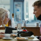 Maeve and Eddie talk over a greasy spoon cafe breakfast