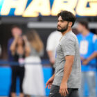 Los Angeles Rams wide receiver Puka Nacua looks on before a preseason NFL football game against the Los Angeles Chargers Thursday, Aug. 27, 2026, in Inglewood, Calif. (AP Photo/Mark J. Terrill)