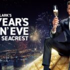 Ryan Seacrest toasts with champagne atop the Times Square ball for Dick Clark’s New Year’s Rockin’ Eve.