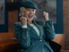 Helen Mirren smiles with and makes a triumphant gesture with her fists in the air in "MobLand" Season 2